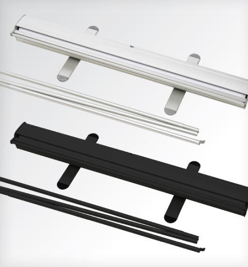 A set of three metal rods accompanied by a black and white handle, arranged neatly for display or use.