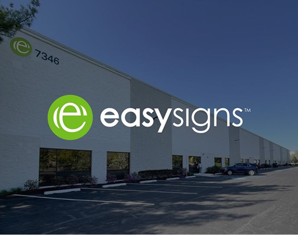 Corporate logo featuring the phrase 'easy signs' in a modern, professional design with a clean aesthetic.