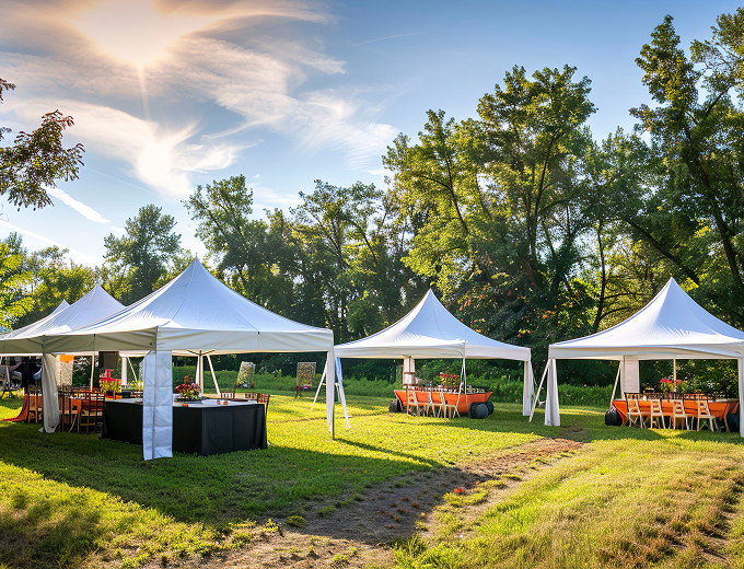 Outdoor wedding tent rentals set up in a picturesque garden, providing a beautiful venue for a romantic celebration.