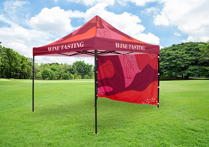 A beautifully designed wine tasting tent featuring elegant decor and tables set for an exquisite tasting experience.