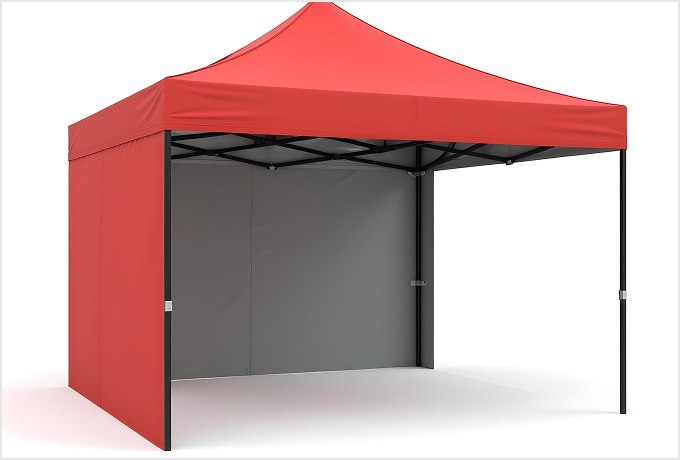 A red tent with a black frame and a white wall set against a neutral background.