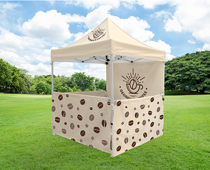 A tent featuring a coffee bean design, showcasing a playful and thematic representation of coffee culture.