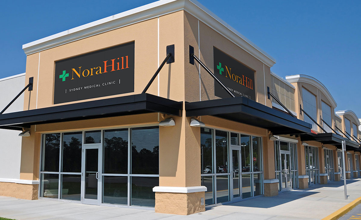 A building featuring a prominent sign displaying the name 'Nora Hill'.